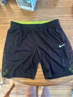 Nike Women’s Black Athletic Shorts with Neon Accent